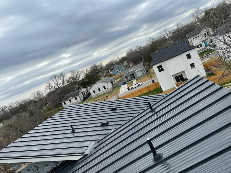 Standing seam metal roof panels with vents for Skylight Repair in Melrose